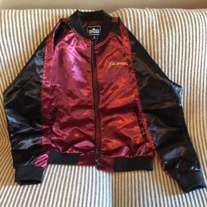 Upscale shiny jacket. New without tags